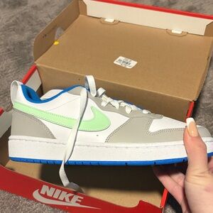 Nike White and Mint Green Sneakers with Blue Sole